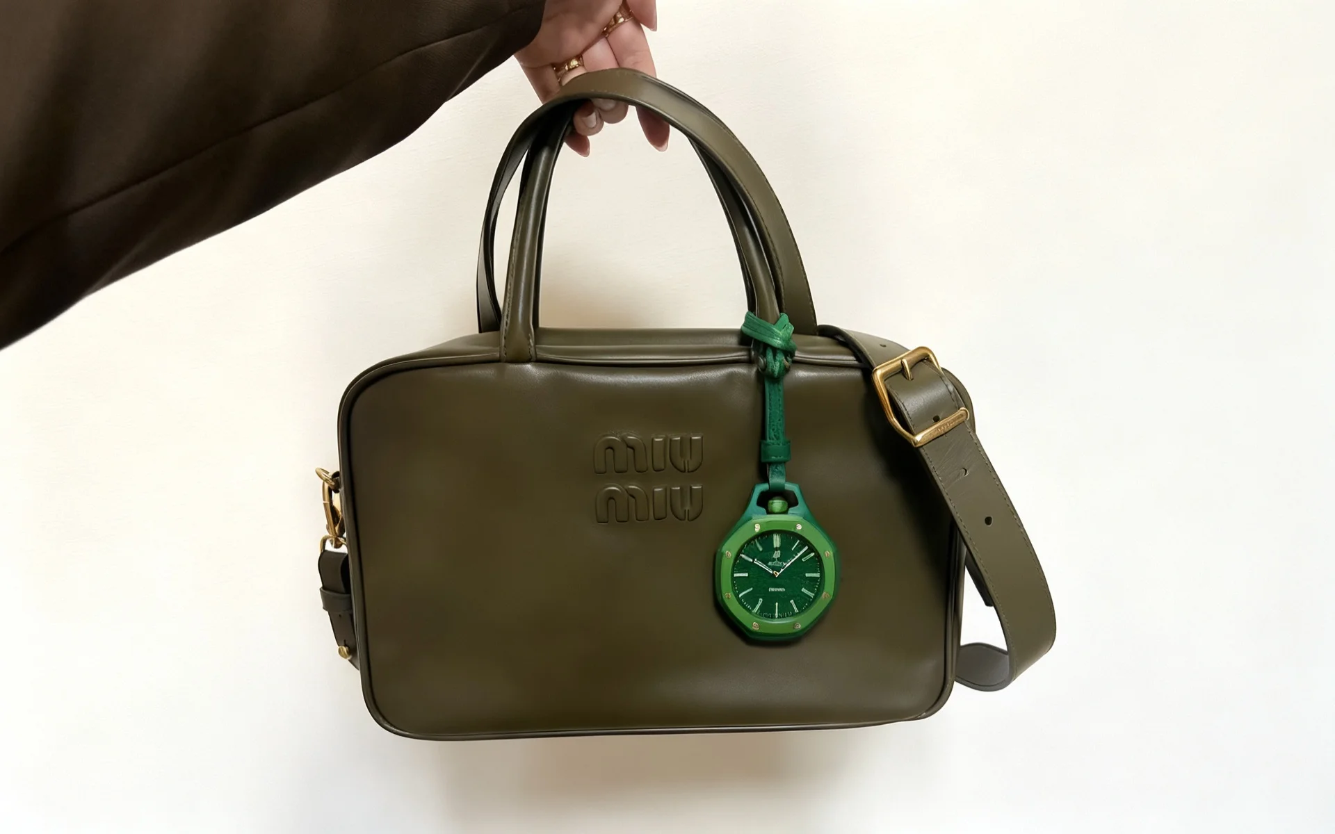 Pocket watch verte en charm sur sac à main
